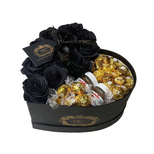 Large Black Heart Box filled with Black Flowers, Lindors, Mini Nutellas, and Ferrero Rochers.