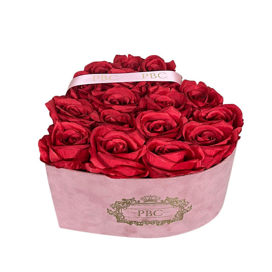 Large blush pink heart box filled with red roses