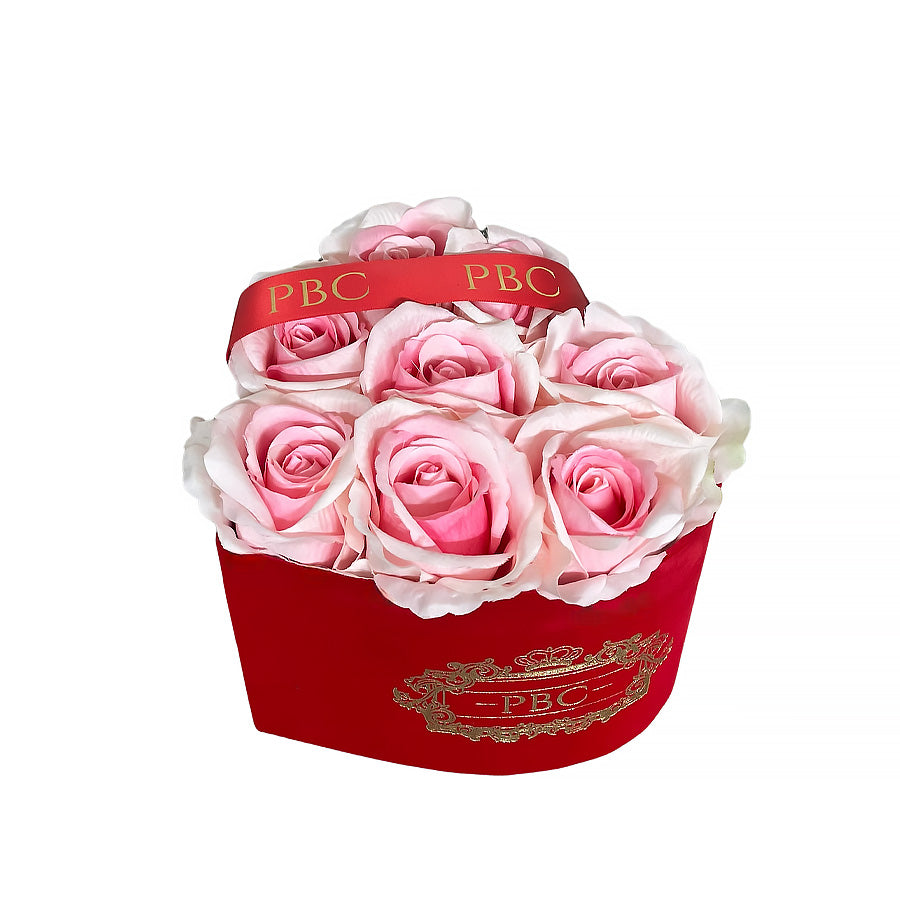 PBC flower box with red ribbon