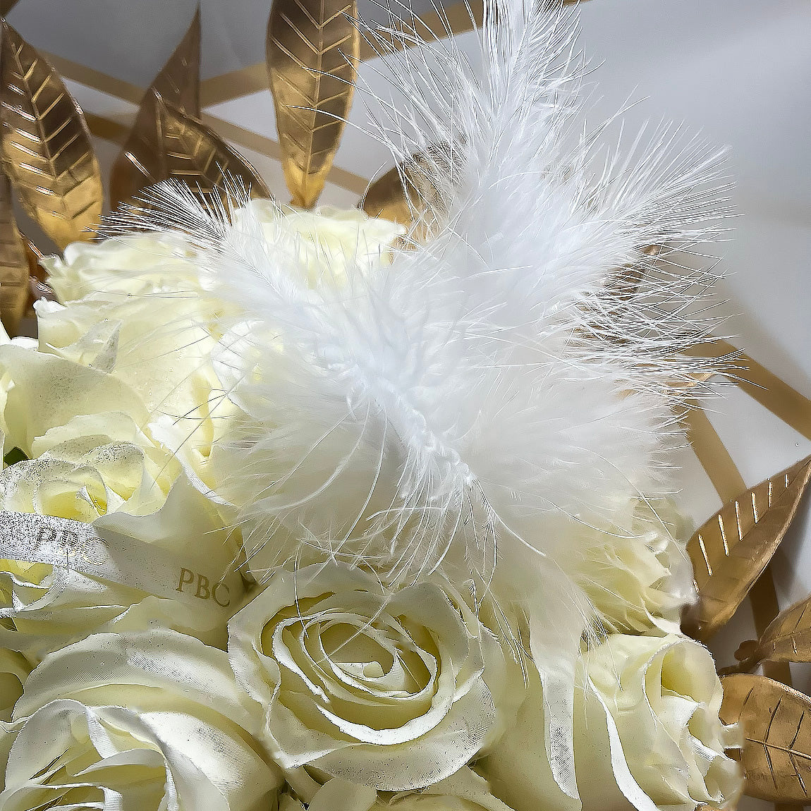 White Decorative Feather on flower bouquet